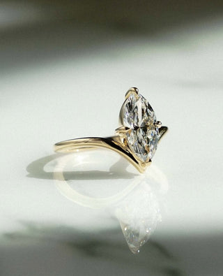 Marquise cut lab grown diamond unique engagement ring in white gold setting