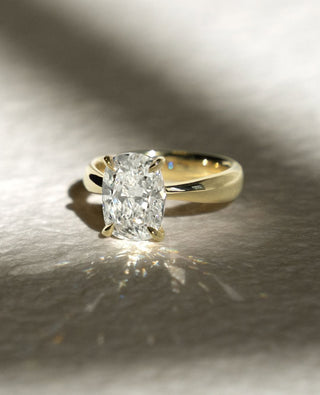 Cushion cut lab grown diamond split shank engagement ring in white gold setting