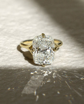 Elongated cushion cut lab grown diamond split shank engagement ring in white gold setting