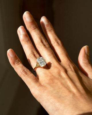 Elongated cushion cut lab grown diamond engagement ring with split shank in white gold