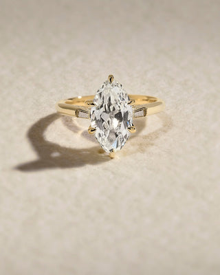 Marquise cut lab grown diamond three stone engagement ring in white gold setting