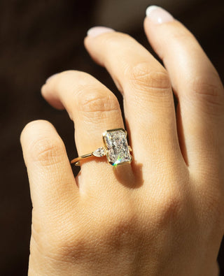 Radiant cut lab grown diamond half bezel engagement ring in white gold setting