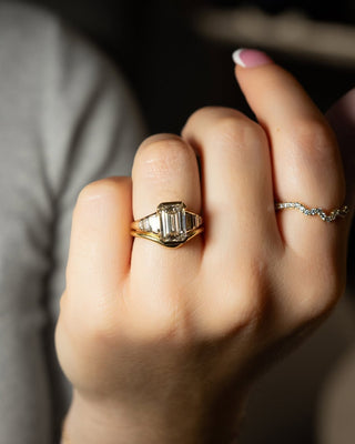 Emerald cut lab grown diamond seven stone engagement ring in white gold setting