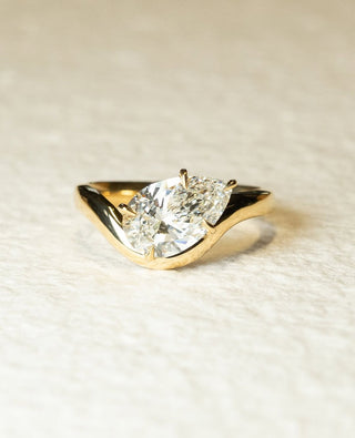Pear cut lab grown diamond unique engagement ring with elegant design