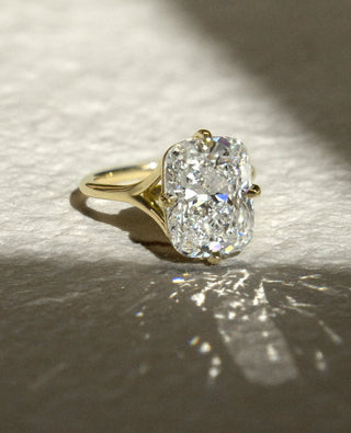 Elongated cushion cut lab grown diamond split shank engagement ring in white gold setting