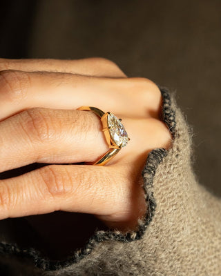 Pear cut lab grown diamond unique engagement ring with elegant design