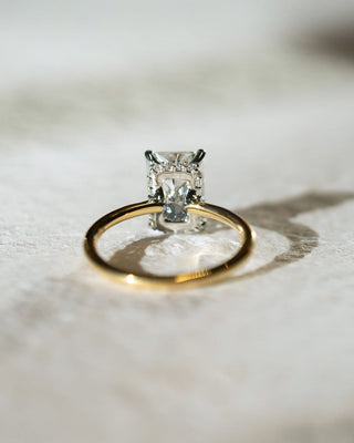 Radiant cut lab grown diamond hidden halo engagement ring in white gold setting