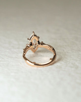 Marquise cut lab grown diamond three stone engagement ring in white gold setting