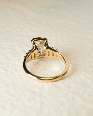 Emerald cut lab grown diamond seven stone engagement ring in white gold setting