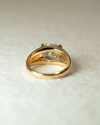 Cushion cut lab grown diamond bezel engagement ring with sleek design